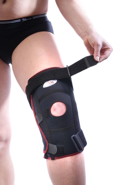 5209 TSM Kniebandage aktiv, offen, mit Patella-Aussparung + DG-Schiene POM
